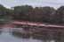 photo of Cranberry harvester on flooded bog.